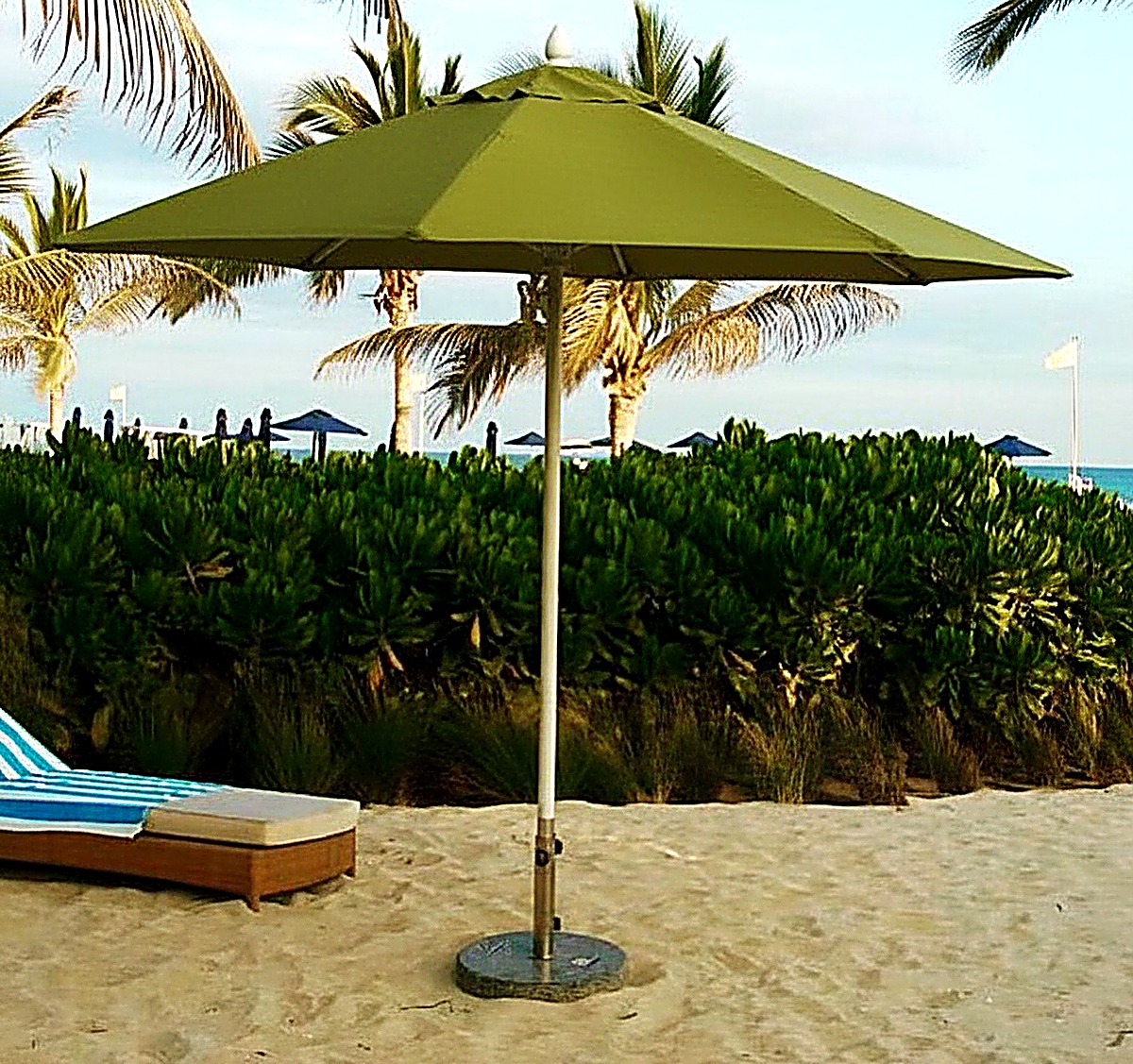 Heavy-duty commercial resort umbrella and outdoor loungers, beach club furniture Dubai