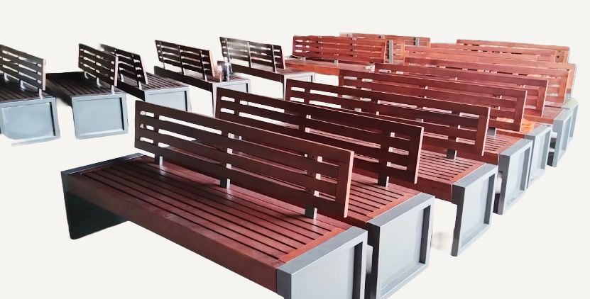 Hardwood bench seating on powder-coated aluminium frame, custom manufactured for campus landscape programme