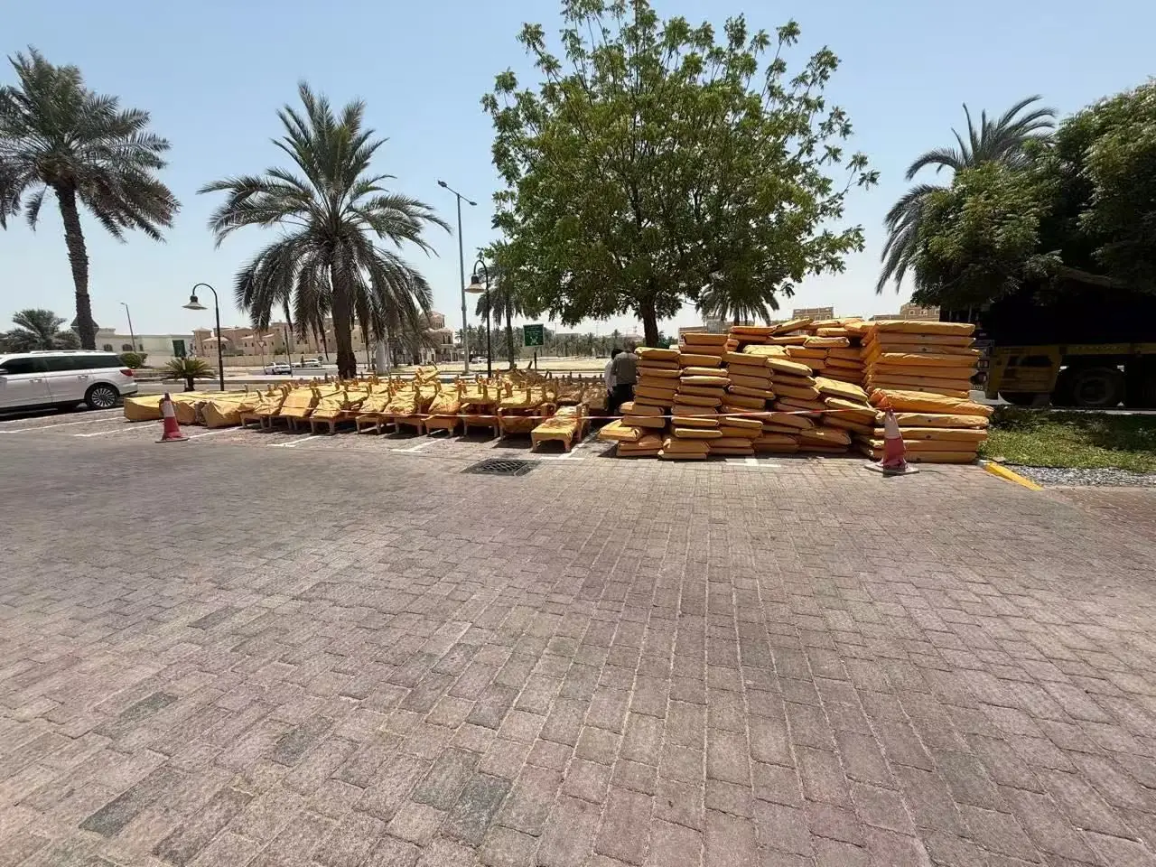Factory-wrapped mattresses and cushions on delivery day, Abu Dhabi resort